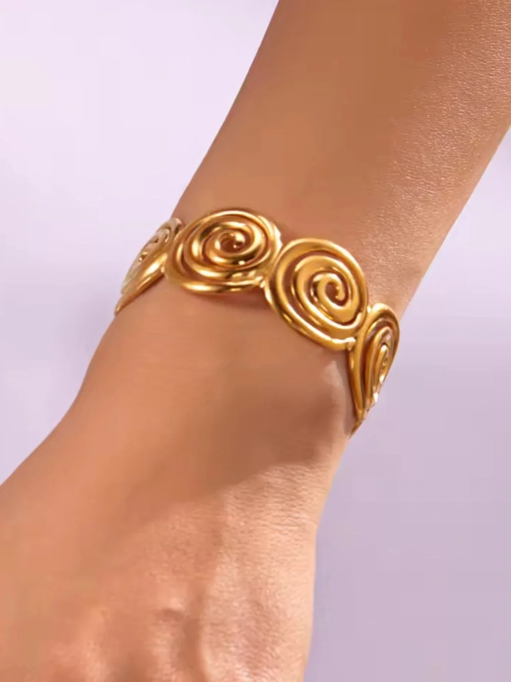 Golden Spiral Cuff Bracelet – Modern Sculptural Statement Jewelry
